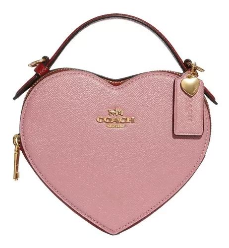 bolsa de corazon coach rosa